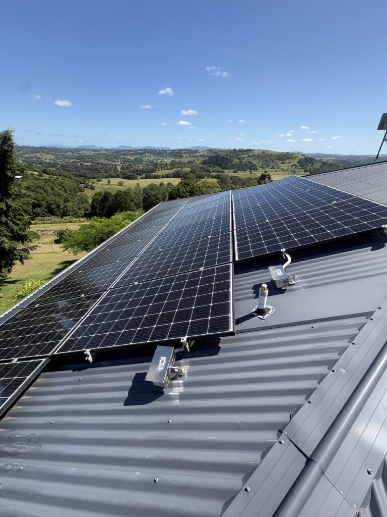 Clean residential solar panels on a metal roof